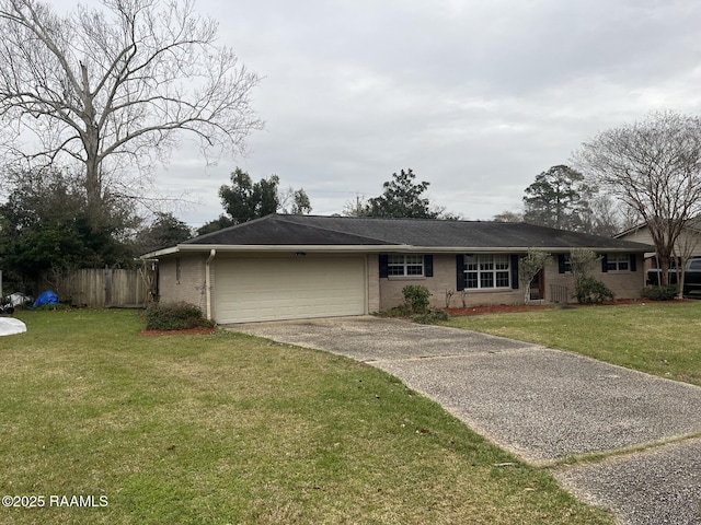 single story home with a garage and a front yard