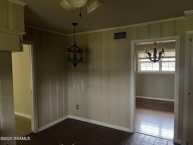 unfurnished dining area featuring ornamental molding