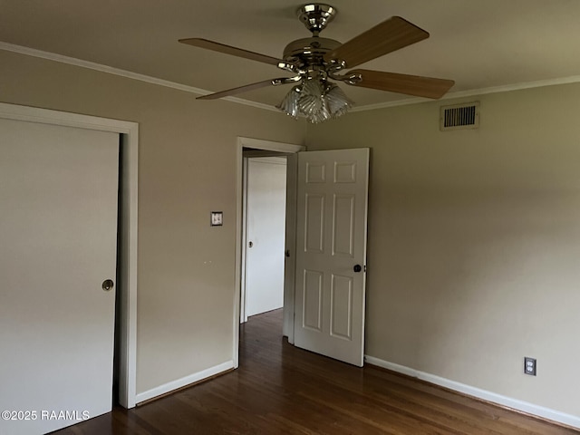 unfurnished bedroom featuring ceiling fan, a closet, and ornamental molding