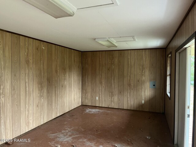 empty room with wood walls