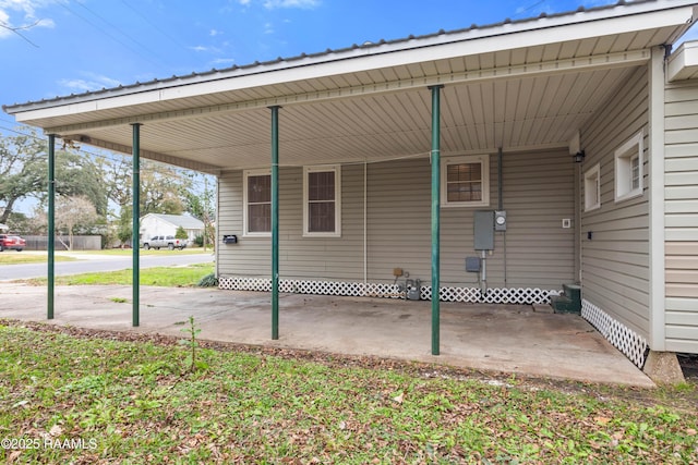 view of patio / terrace with a carport