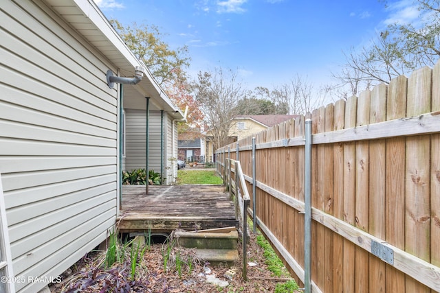 view of yard featuring a wooden deck