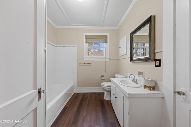 full bathroom featuring toilet, vanity, wood-type flooring, tub / shower combination, and ornamental molding