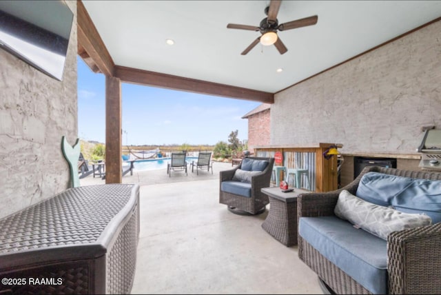 view of patio / terrace with ceiling fan and an outdoor hangout area