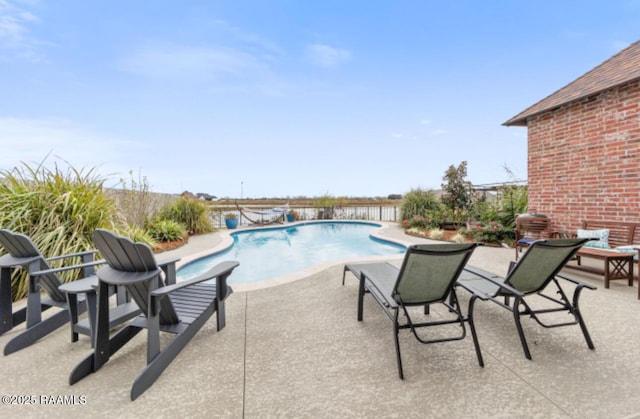 view of pool with a patio area