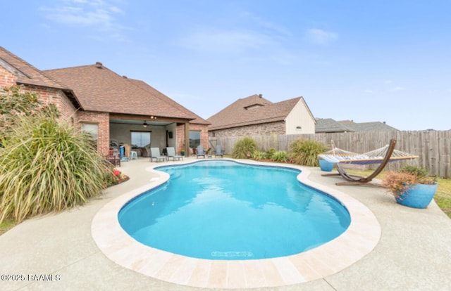 view of pool featuring a patio area