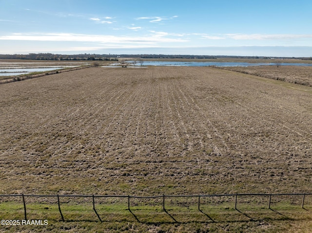 bird's eye view featuring a water view and a rural view