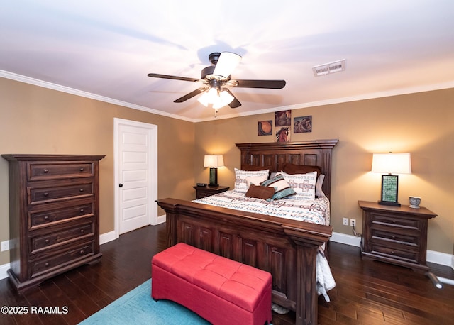 bedroom with ornamental molding, dark hardwood / wood-style floors, and ceiling fan