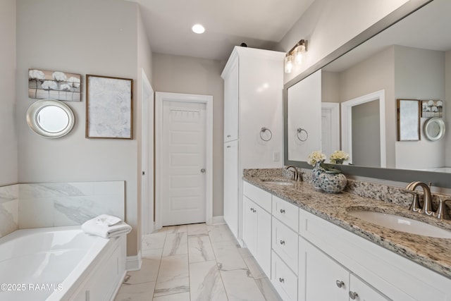 bathroom featuring vanity and a bathing tub