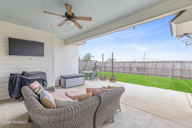 view of patio featuring outdoor lounge area, ceiling fan, and a grill