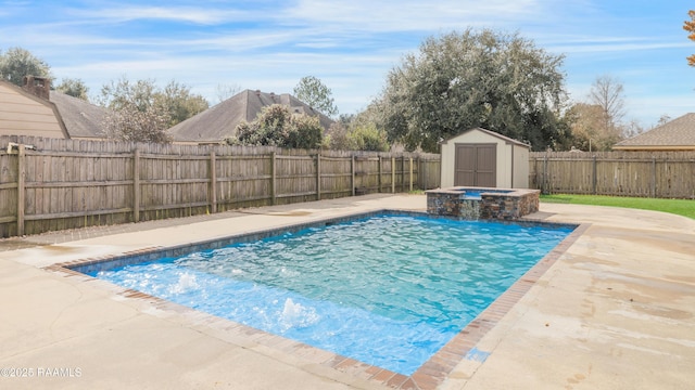 view of swimming pool with a patio, a storage unit, and an in ground hot tub