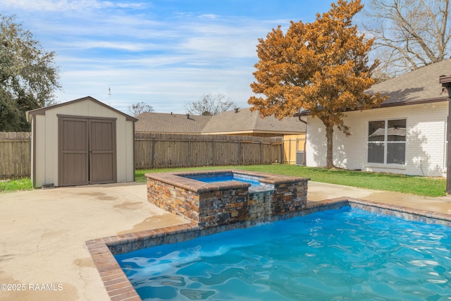 view of swimming pool featuring an in ground hot tub, a patio area, and a storage unit