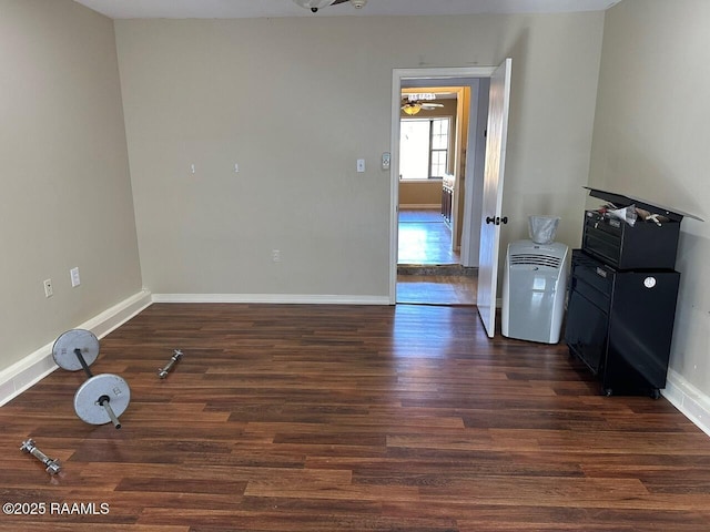 spare room featuring dark hardwood / wood-style floors