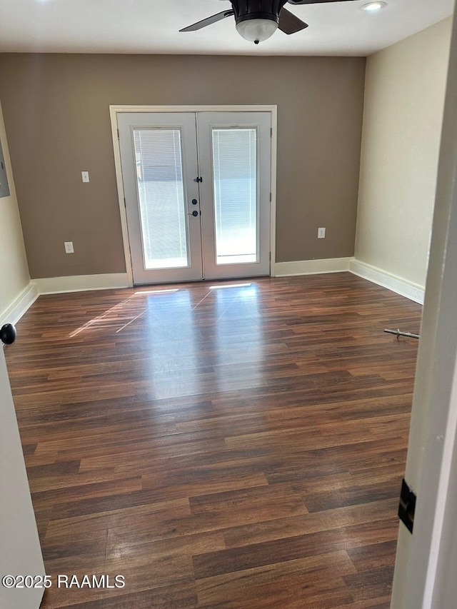 unfurnished room featuring french doors, ceiling fan, and dark hardwood / wood-style flooring