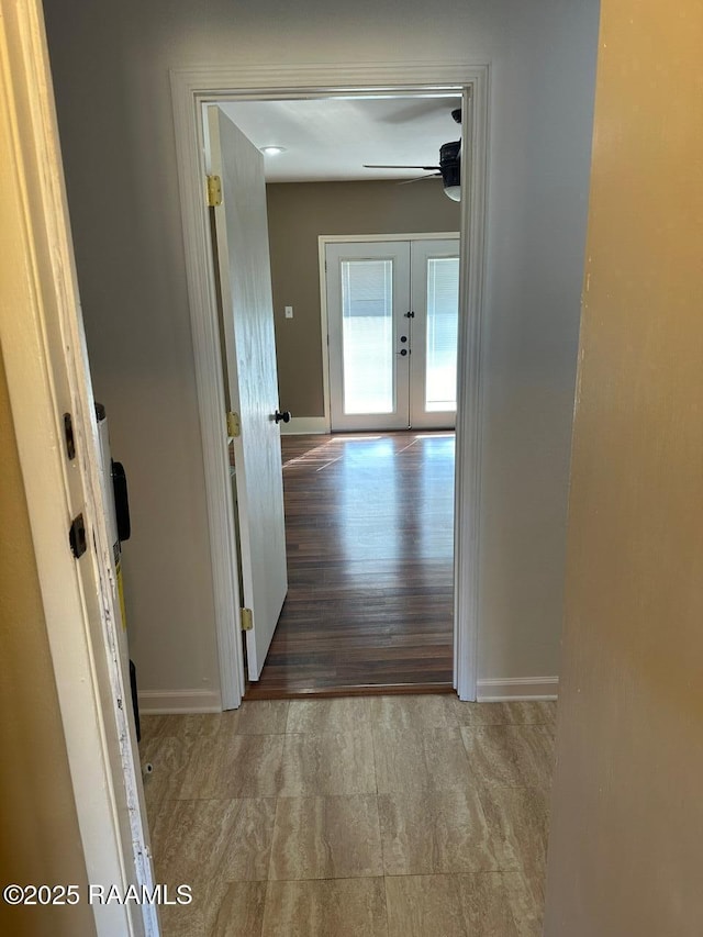 corridor featuring french doors