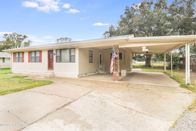 view of front of home with a carport