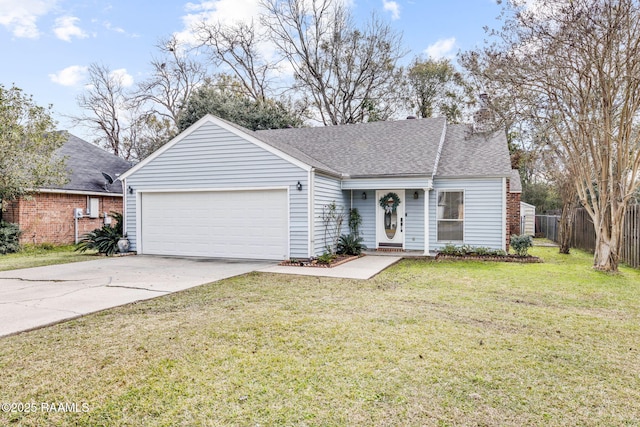 view of front of house with a front lawn and a garage