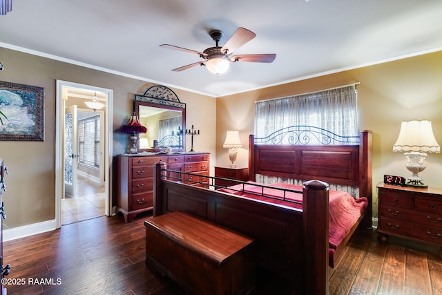 bedroom with ceiling fan, dark hardwood / wood-style flooring, connected bathroom, and crown molding