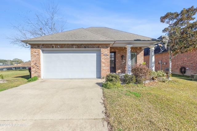 view of front facade featuring a garage and a front yard