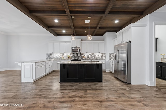 kitchen with pendant lighting, appliances with stainless steel finishes, white cabinetry, an island with sink, and wooden ceiling