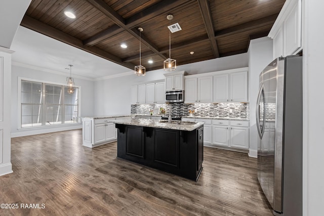 kitchen featuring white cabinetry, stainless steel appliances, and a kitchen island with sink