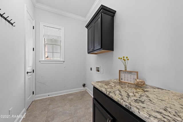 washroom featuring cabinets, electric dryer hookup, ornamental molding, hookup for a washing machine, and light tile patterned floors