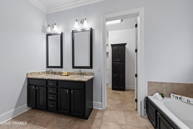 bathroom with vanity, tile patterned floors, crown molding, and a washtub