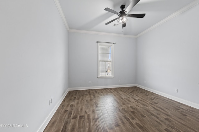 spare room with ceiling fan, dark hardwood / wood-style flooring, and ornamental molding