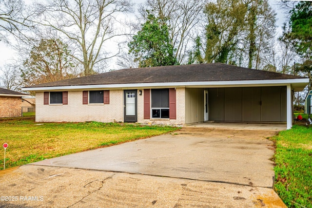 ranch-style house with a carport and a front yard