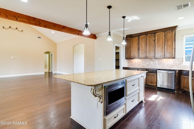 kitchen with stainless steel appliances, a kitchen breakfast bar, tasteful backsplash, light stone countertops, and dark hardwood / wood-style flooring