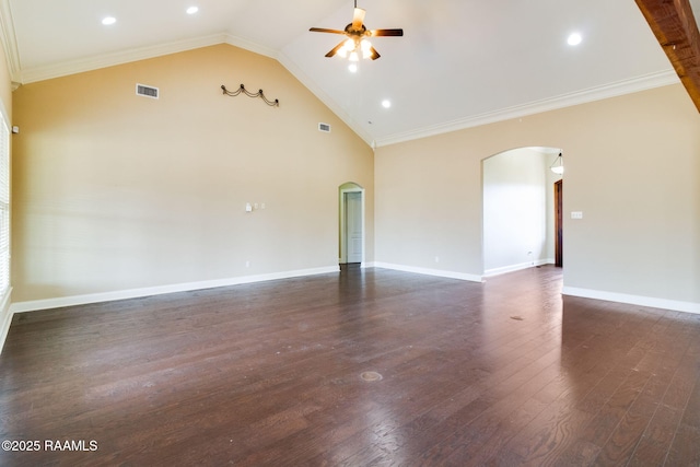 unfurnished room with crown molding, ceiling fan, dark hardwood / wood-style flooring, and high vaulted ceiling