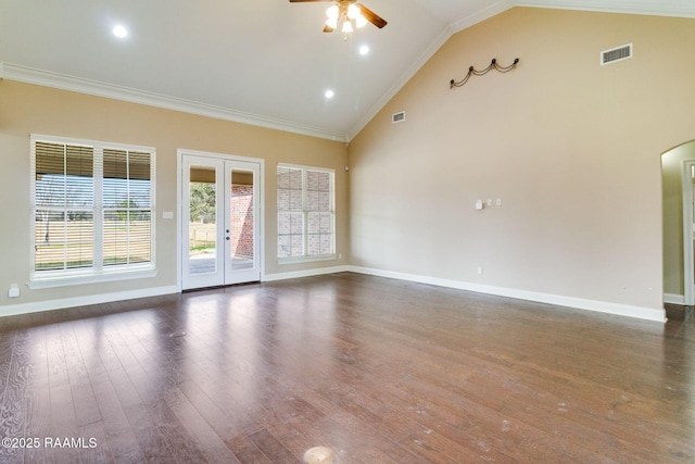 spare room featuring ceiling fan, high vaulted ceiling, ornamental molding, dark hardwood / wood-style flooring, and french doors