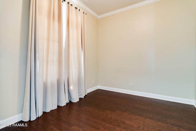 unfurnished room with crown molding and dark wood-type flooring