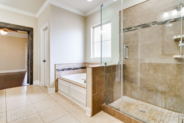 bathroom featuring tile patterned flooring, crown molding, and independent shower and bath