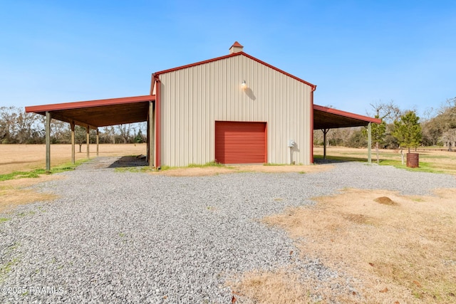 view of outbuilding with a garage