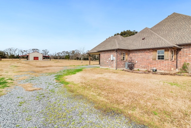 view of home's exterior featuring a lawn