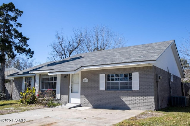 single story home featuring cooling unit