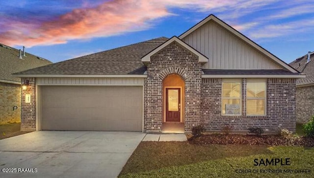 view of front of home with a garage