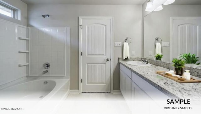 bathroom featuring shower / washtub combination and vanity