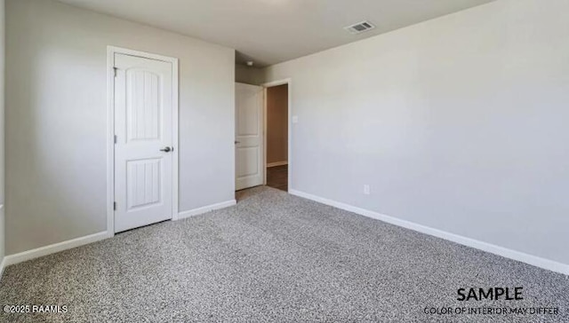 unfurnished bedroom with carpet flooring