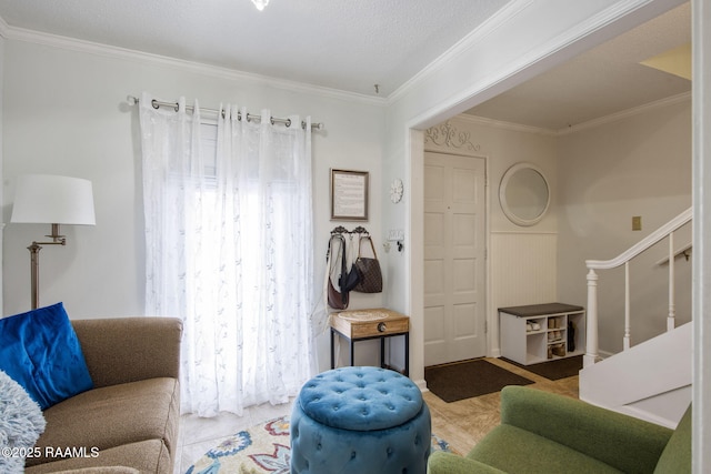 tiled living room featuring a textured ceiling and ornamental molding