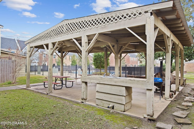 view of property's community featuring a bar