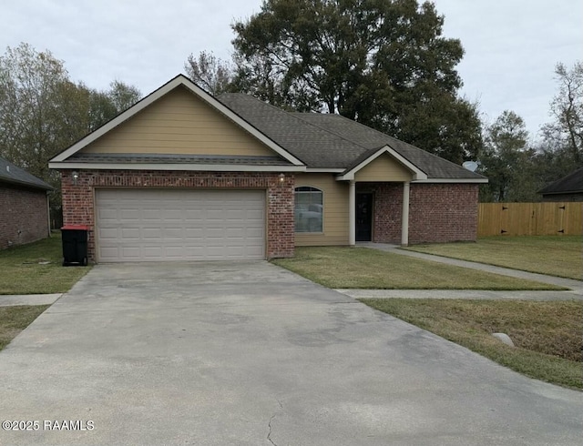 ranch-style house with a front lawn and a garage