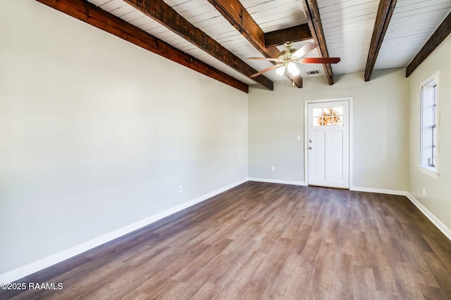 spare room with hardwood / wood-style flooring, wood ceiling, beam ceiling, and ceiling fan