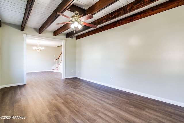 spare room featuring ceiling fan with notable chandelier, dark hardwood / wood-style flooring, beam ceiling, and wood ceiling