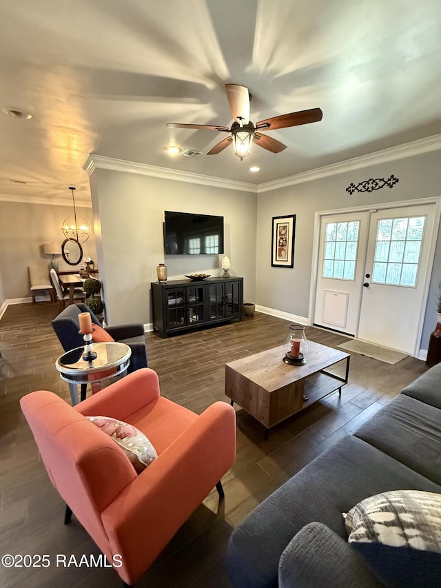 living room featuring dark hardwood / wood-style flooring, crown molding, and ceiling fan