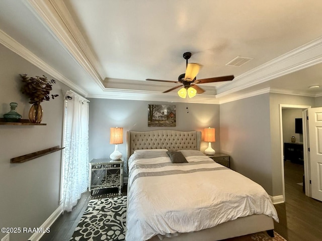 bedroom with dark hardwood / wood-style flooring, ornamental molding, and ceiling fan