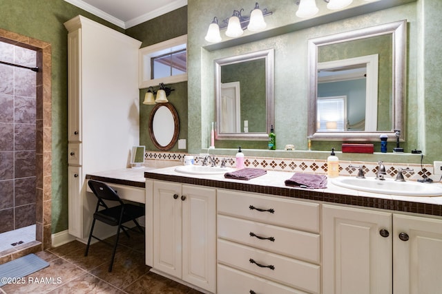 bathroom featuring a tile shower, backsplash, vanity, ornamental molding, and tile patterned floors