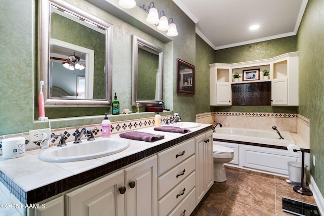 bathroom with a washtub, ceiling fan, vanity, ornamental molding, and toilet