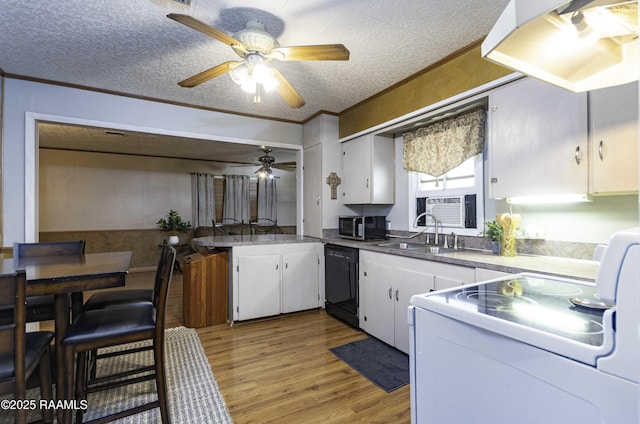 kitchen featuring sink, black dishwasher, white cabinetry, white range with electric cooktop, and light wood-type flooring